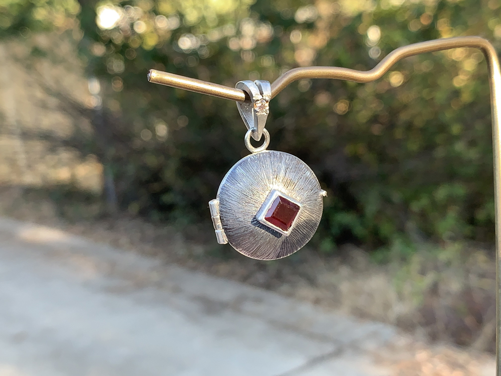 Sterling Silver Lockett with Garnet and White CZ